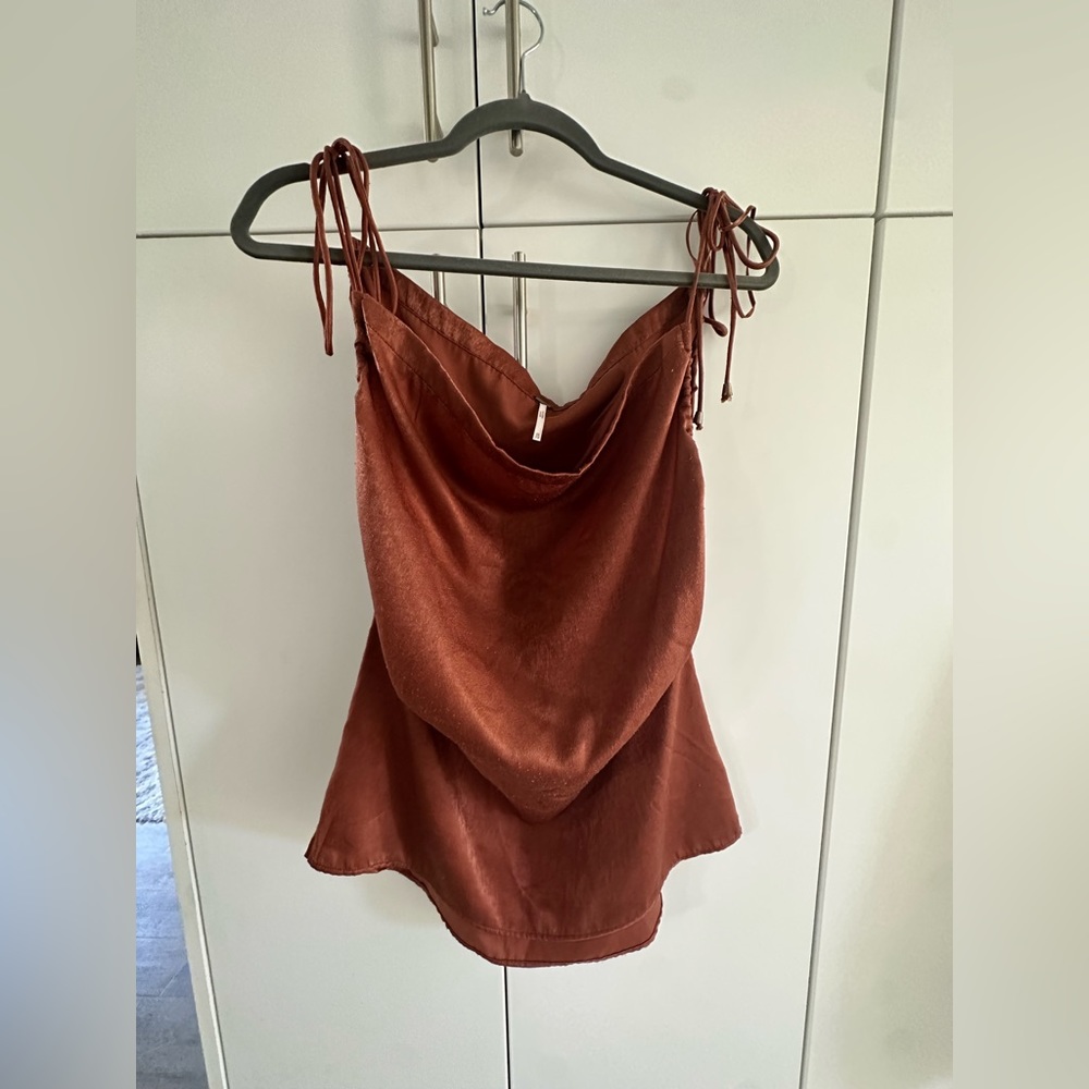 Free people adjustable dainty strap top.
